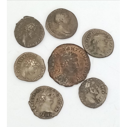 1747 - A Collection of Seven Roman Coins. Please see photos for finer details.