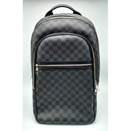 72 - A LOUIS VUITTON DAMIER BACKPACK IN GRAPHITE COLOUR. WITH A FRONT ZIPPERED COMPARTMENT AND ZIPPER POC... 