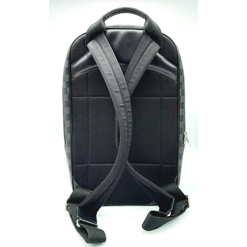 72 - A LOUIS VUITTON DAMIER BACKPACK IN GRAPHITE COLOUR. WITH A FRONT ZIPPERED COMPARTMENT AND ZIPPER POC... 