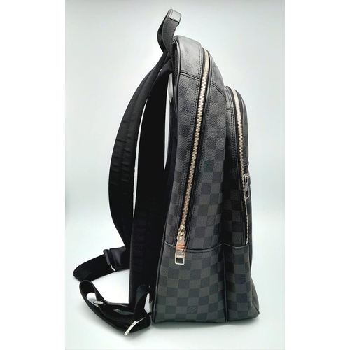 72 - A LOUIS VUITTON DAMIER BACKPACK IN GRAPHITE COLOUR. WITH A FRONT ZIPPERED COMPARTMENT AND ZIPPER POC... 