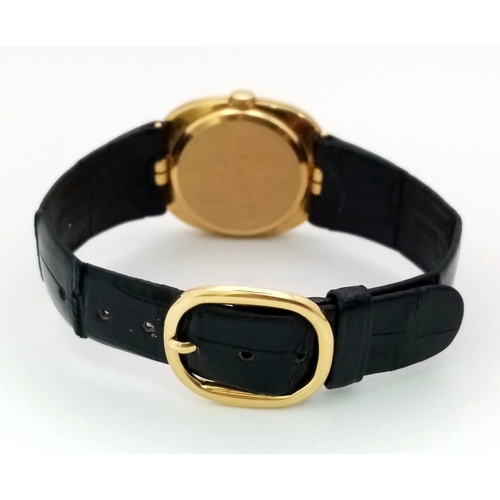 78 - A Vintage Patek Phillipe 18K Gold Gents Watch. Original black leather strap with 18k gold buckle. 18... 