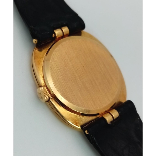 78 - A Vintage Patek Phillipe 18K Gold Gents Watch. Original black leather strap with 18k gold buckle. 18... 