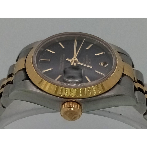 36 - A Bi-Metal Rolex Oyster Perpetual Datejust Ladies Watch. Bi-metal bracelet and case - 26mm. Black di... 