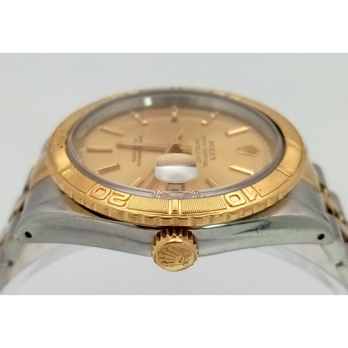 43 - A Bi-Metal Rolex Oyster Perpetual Datejust Gents Watch. Bi-metal strap and case - 36mm. Gold tone di... 