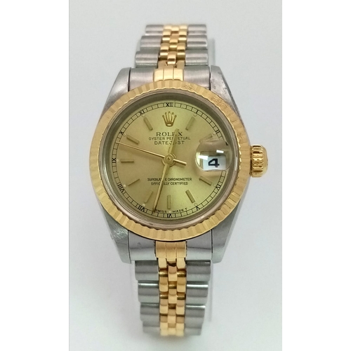 149 - A Bi-Metal Rolex Oyster Perpetual Datejust Ladies Watch. Bi-metal bracelet and case - 26mm. Gold ton... 