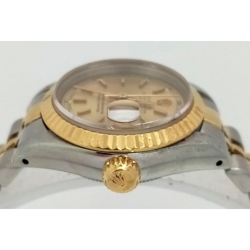 149 - A Bi-Metal Rolex Oyster Perpetual Datejust Ladies Watch. Bi-metal bracelet and case - 26mm. Gold ton... 