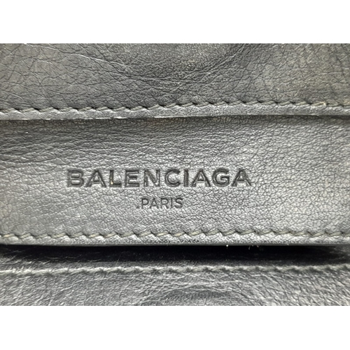 249 - A Balenciaga Blue Papier A4 Leather Satchel. An exterior front zip pocket, rolled leather handles an... 