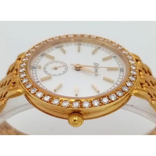 261 - A Delaneau 18k Yellow Gold and Diamond-Set Ladies Watch. 18k gold bracelet and case - 34mm. White di... 