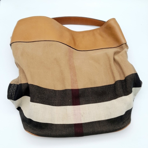 284 - A BURBERRY ASHBY BROWN HOBO BAG. FROM THE ASHBY BROWN COLLECTION, CANVAS WITH LEATHER TRIM, METAL HA... 