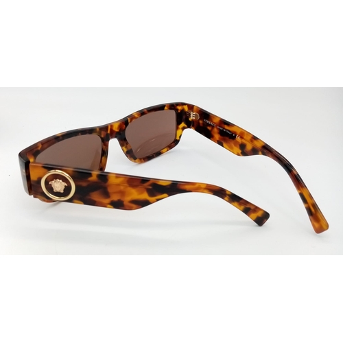 296 - A Pair of Versace Sunglasses with Case. Ref: 13744