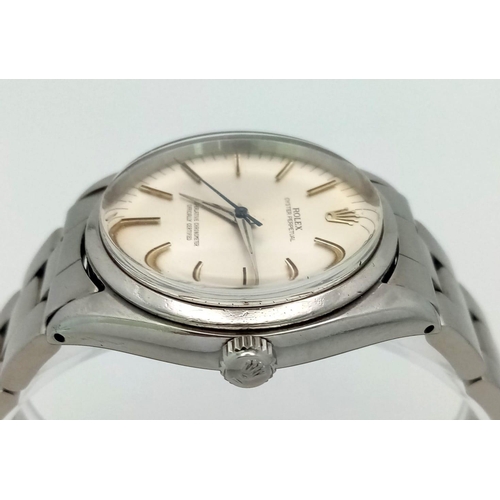 338 - A Rolex Oyster Perpetual Automatic Gents Watch. Stainless steel strap and case - 35mm. Silver tone d... 