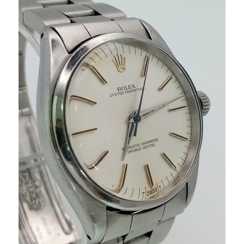 338 - A Rolex Oyster Perpetual Automatic Gents Watch. Stainless steel strap and case - 35mm. Silver tone d... 