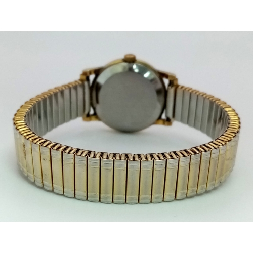 379 - An Omega Deville Quartz Ladies Watch. Expandable comfort gilded bracelet. Case - 25mm. Gold tone dia... 