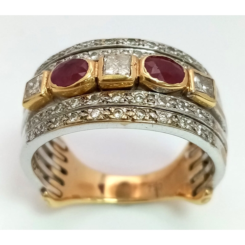 11 - A Statement 18k Yellow, White Gold and Gemstone Band Ring.  A Central reservation of oval rubies and... 