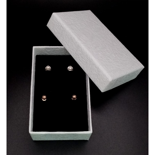 1753 - Two Pairs of Earrings - 925 Silver White Stone Stud and 9K Gold Ball Stud.