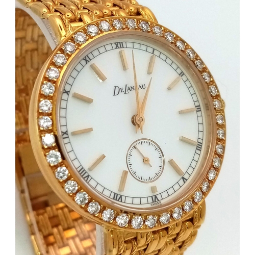 261 - A Delaneau 18k Yellow Gold and Diamond-Set Ladies Watch. 18k gold bracelet and case - 34mm. White di... 