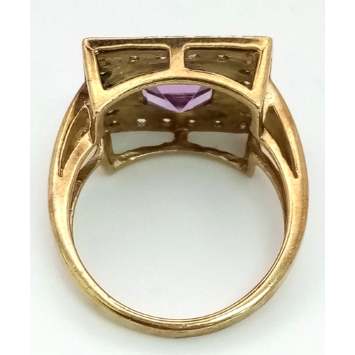 263 - A 9K Diamond and Amethyst ring. Total weight 5.5 grams. Size N. 13637