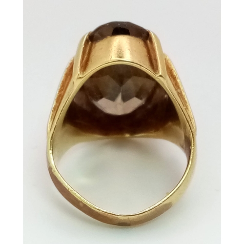 270 - A 14k Gold Smoky Quartz ring. Total weight 12 grams. Size K. 13702