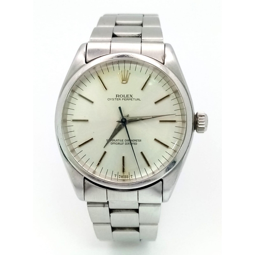 338 - A Rolex Oyster Perpetual Automatic Gents Watch. Stainless steel strap and case - 35mm. Silver tone d... 