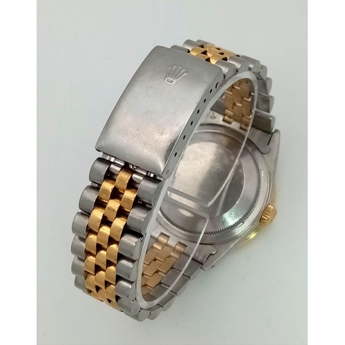 43 - A Bi-Metal Rolex Oyster Perpetual Datejust Gents Watch. Bi-metal strap and case - 36mm. Gold tone di... 