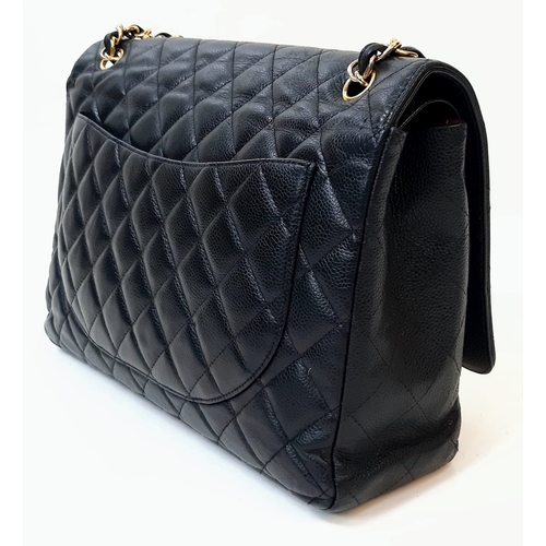 52 - A CHANEL BLACK QUILTED CAVIAR LEATHER MAXI CLASSIC DOUBLE FLAP BAG. 22CM X 34CM. GOLD TONE HARDWARE,... 