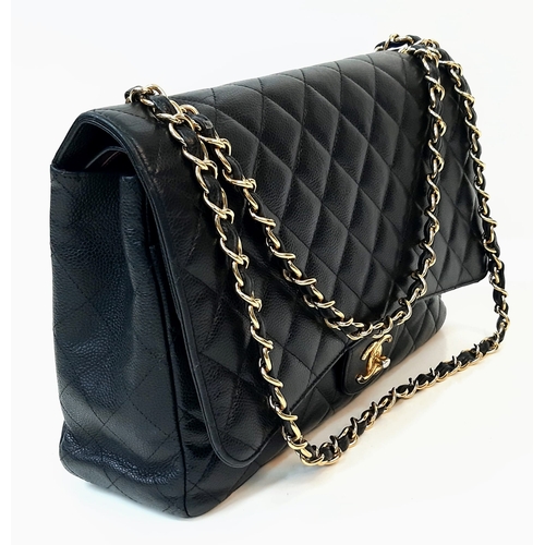 52 - A CHANEL BLACK QUILTED CAVIAR LEATHER MAXI CLASSIC DOUBLE FLAP BAG. 22CM X 34CM. GOLD TONE HARDWARE,... 