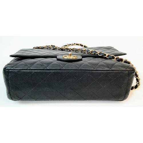 52 - A CHANEL BLACK QUILTED CAVIAR LEATHER MAXI CLASSIC DOUBLE FLAP BAG. 22CM X 34CM. GOLD TONE HARDWARE,... 