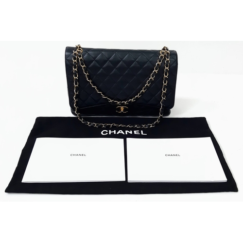 52 - A CHANEL BLACK QUILTED CAVIAR LEATHER MAXI CLASSIC DOUBLE FLAP BAG. 22CM X 34CM. GOLD TONE HARDWARE,... 