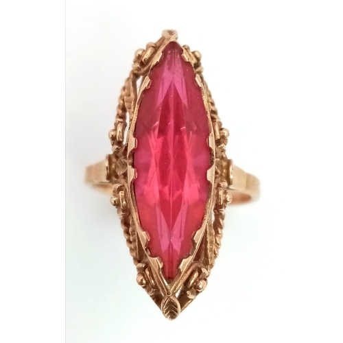 86 - A 14K gold Ruby ring with nicely ornate decoration. Total weight 6.63 grams. Size Q. 13698