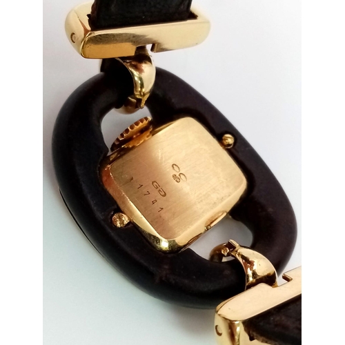 282 - A  very rare Fred of Paris 18K Gold Ladies Watch. Black leather and gilded metal bracelet. 18k gold ... 