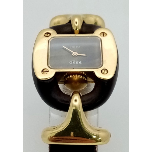 282 - A  very rare Fred of Paris 18K Gold Ladies Watch. Black leather and gilded metal bracelet. 18k gold ... 