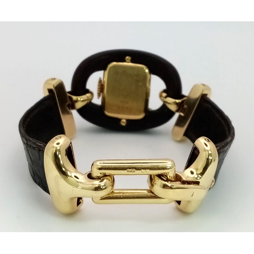 282 - A  very rare Fred of Paris 18K Gold Ladies Watch. Black leather and gilded metal bracelet. 18k gold ... 