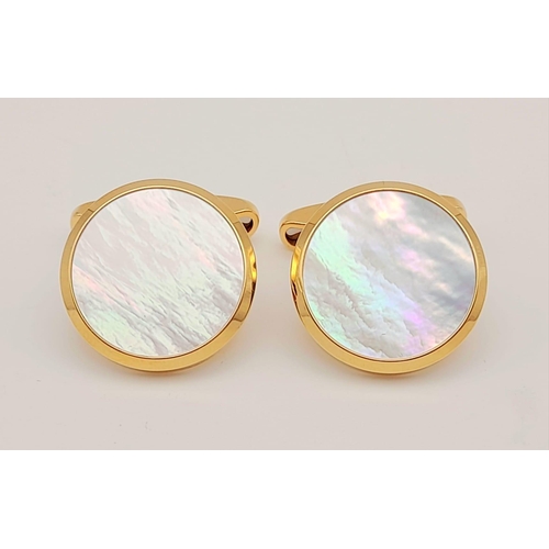 317 - A Pair of Chopard 18k Gold and Mother of Pearl Cufflinks. Comes with a certificate of origin and ori... 