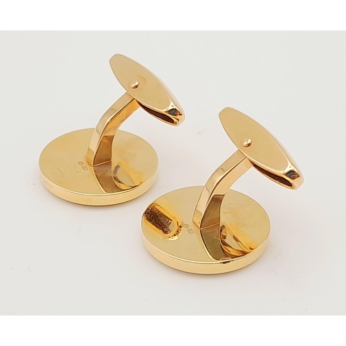 317 - A Pair of Chopard 18k Gold and Mother of Pearl Cufflinks. Comes with a certificate of origin and ori... 