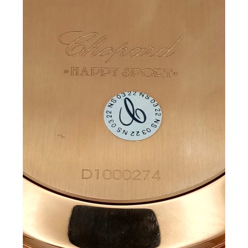 162 - A Chopard Happy Sport Table Clock. Beautifull rose gold plating with a metallic green dial. In excel... 