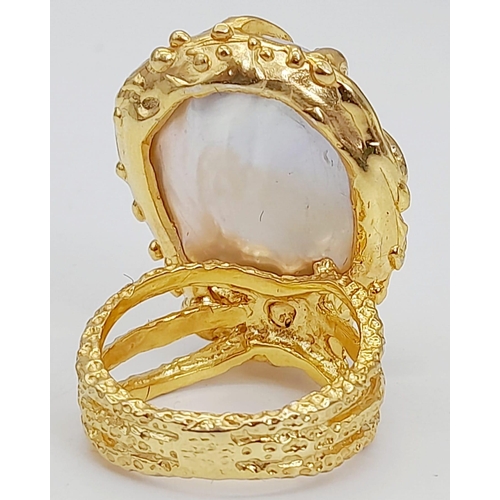 112 - An original, designer, one of, sterling silver and gold ring with a massive baroque natural pearl (2... 