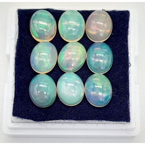 126 - Nine, top grade, Australian, oval cabochon, OPAL stones, with excellent iridescent hues. Dimensions:... 