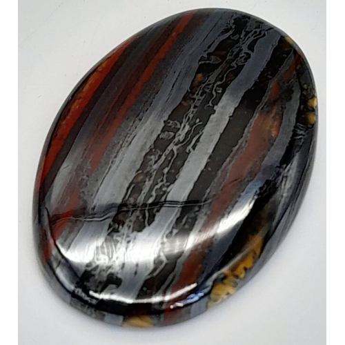 224 - A palaeontological gem, a BANDED IRON FORMATION oval cabochon from Western Australia. Dimensions: 38... 