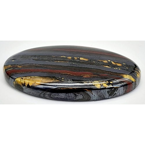 224 - A palaeontological gem, a BANDED IRON FORMATION oval cabochon from Western Australia. Dimensions: 38... 