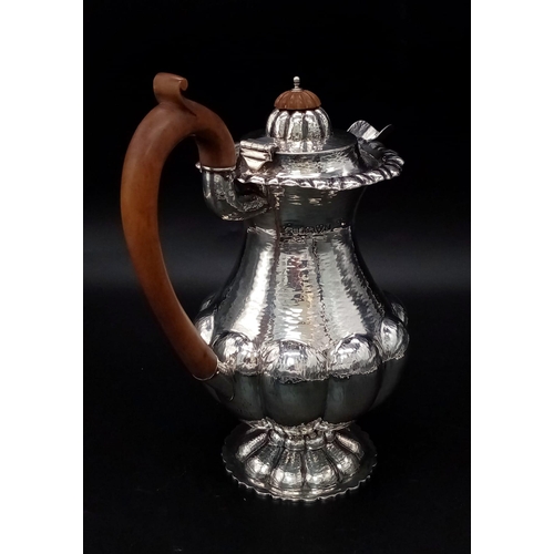 40 - An Edward VII planished silver coffee biggin, Nathan & Hayes, Chester 1909. Having a part lobed balu... 