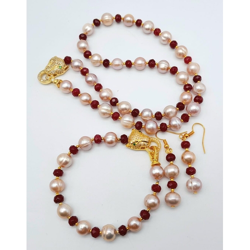 105 - A very attractive, pink pearl and faceted ruby necklace, bracelet and earrings set with PANTHER clas... 