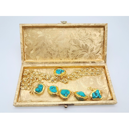 119 - A fabulous, lavishly gold filled, fancy linked chain with a turquoise nugget pendant and matching br... 