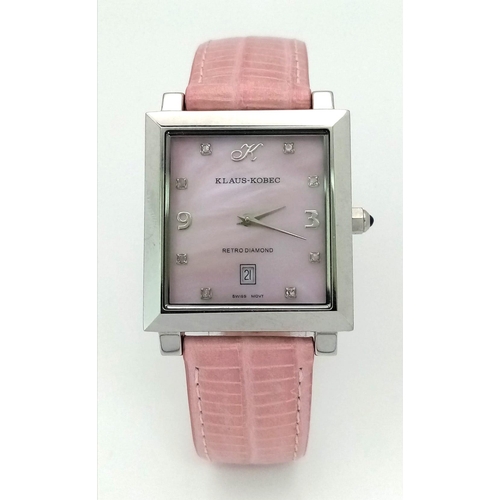 A Klaus Kobec Retro Diamond Ladies Watch. Pink strap and dial. Quartz movement in working order