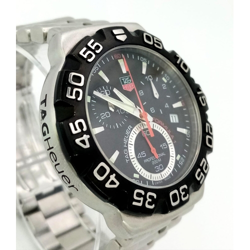 287 - A Tag Heuer Formula 1  Chronograph Watch. Stainless steel strap and case -39mm. Black dial with thre... 