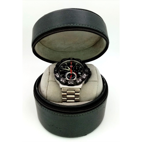 287 - A Tag Heuer Formula 1  Chronograph Watch. Stainless steel strap and case -39mm. Black dial with thre... 