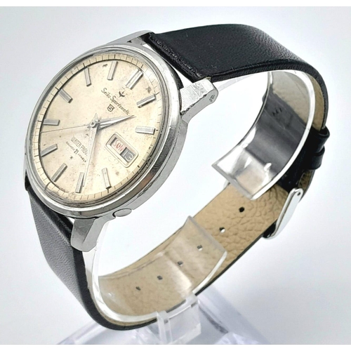 95 - A Rare Vintage Seiko 5 Sportsmatic Gents Watch. 21 jewels, black leather strap. Stainless steel case... 