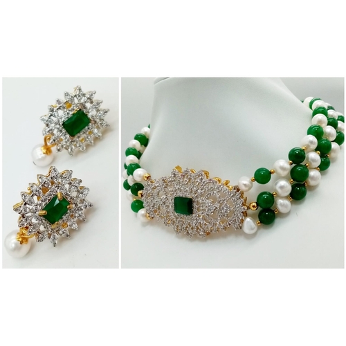 97 - A Green Jade and Cultured Pearl Three Row Choker Necklace.  Artistic jade and white stone centre-pie... 