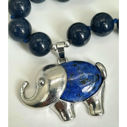 1685 - A Lapis Lazuli Elephant Pendant on a Lapis Necklace. Pendant - 4cm. Necklace - 42cm. Beads -10mm.