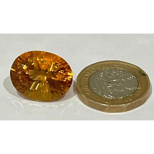 1686 - An 18ct Cognac Coloured Citrine Oval Cut Gemstone with a Trillion Base. No visible marks or inclusio... 