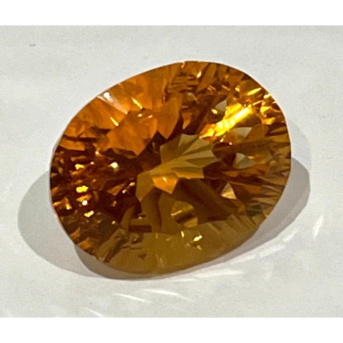 1686 - An 18ct Cognac Coloured Citrine Oval Cut Gemstone with a Trillion Base. No visible marks or inclusio... 